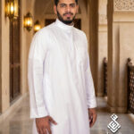 Man wearing a SHIAAR white Saudi thobe